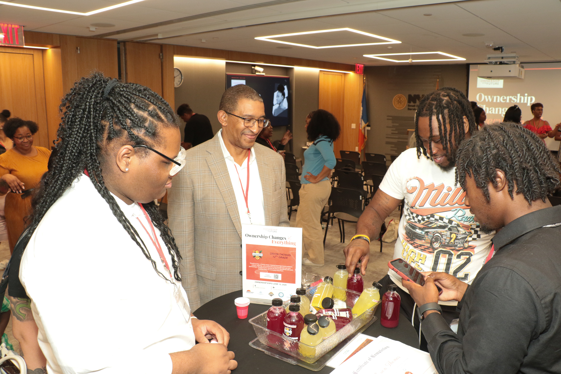 Student founders showing their venture to customers at an OITF showcase